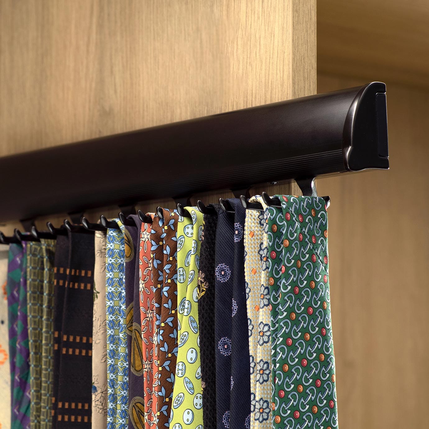 Custom closet accessories rack for necklaces scarves and belts custom designed by California Closets